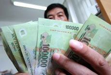 Doanh nghiệp quá ‘sùng’ USD